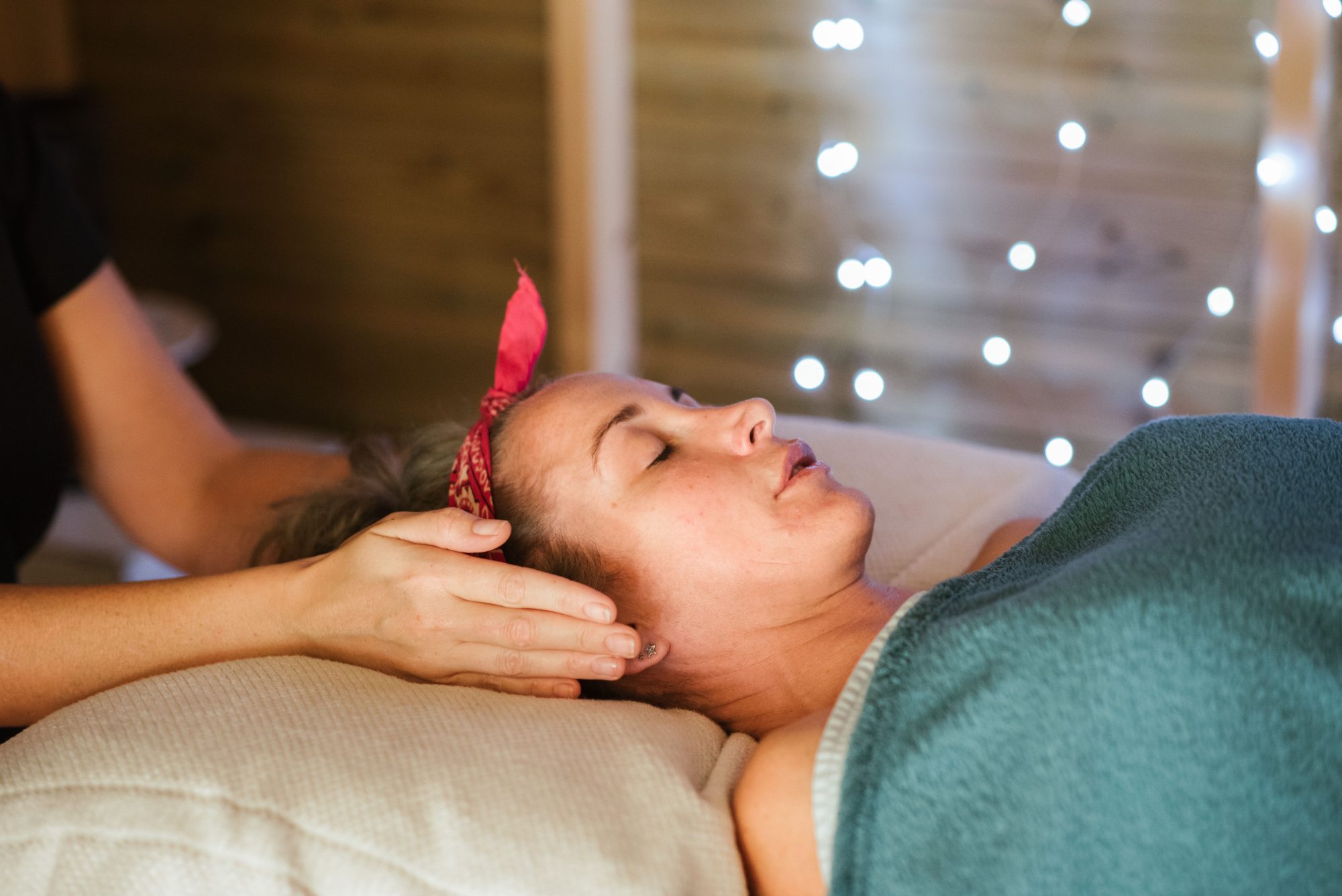 woman receiving Reiki at her head
